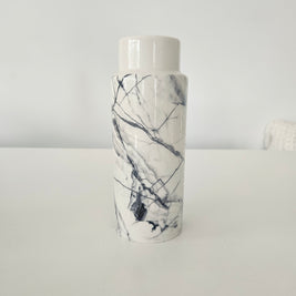 Vase with a marble pattern on a white background