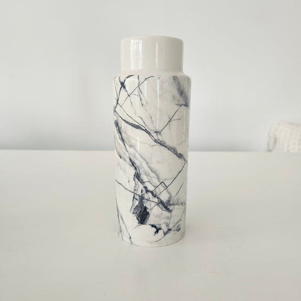 Vase with a marble pattern on a white background