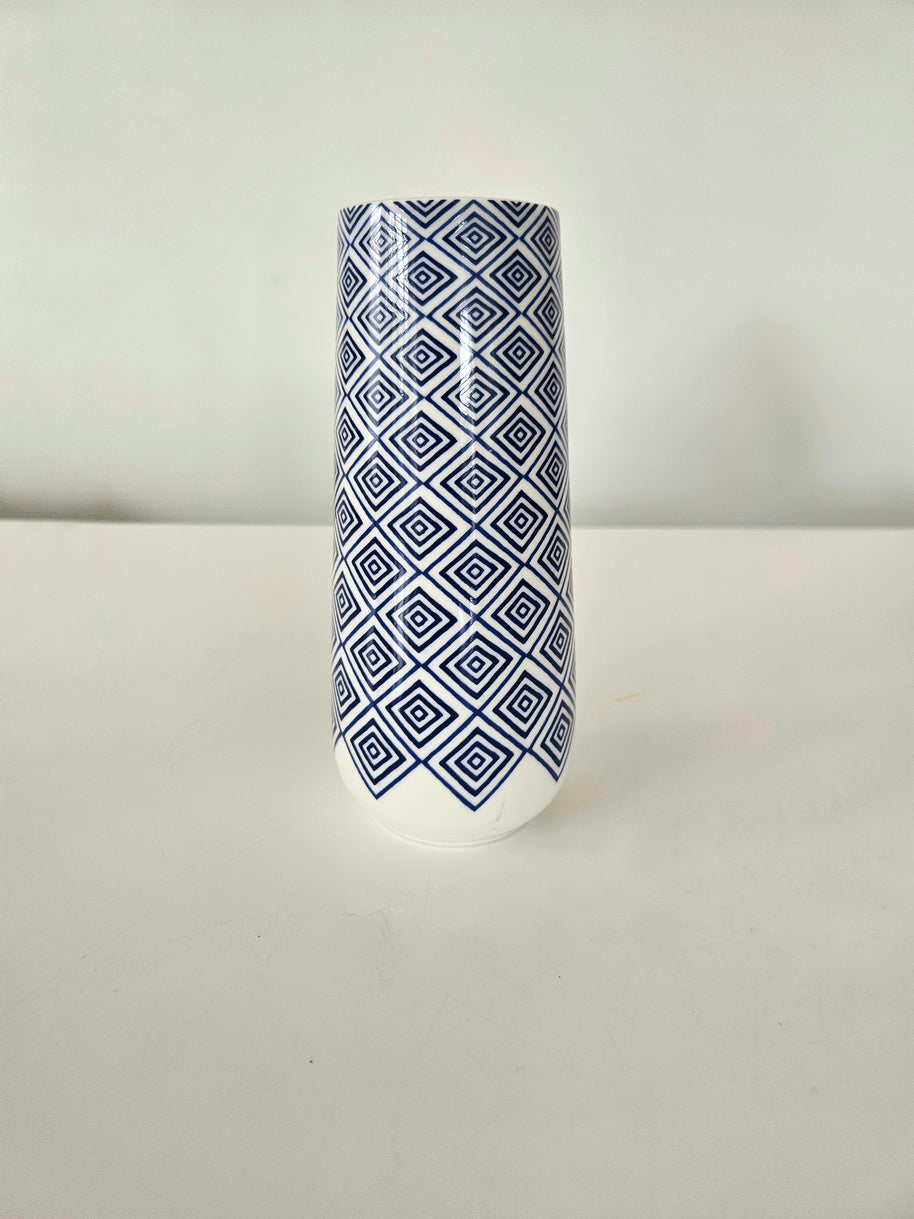 Blue and white checkered ceramic vase arrangement