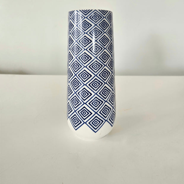 Blue and white checkered ceramic vase arrangement