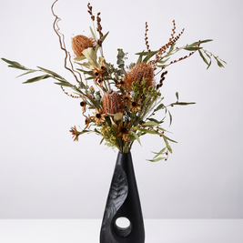 Black industrial chic vase arrangement