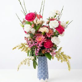 Blue and white checkered ceramic vase arrangement