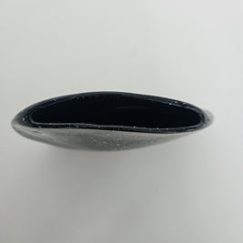 Top down view of a black vase