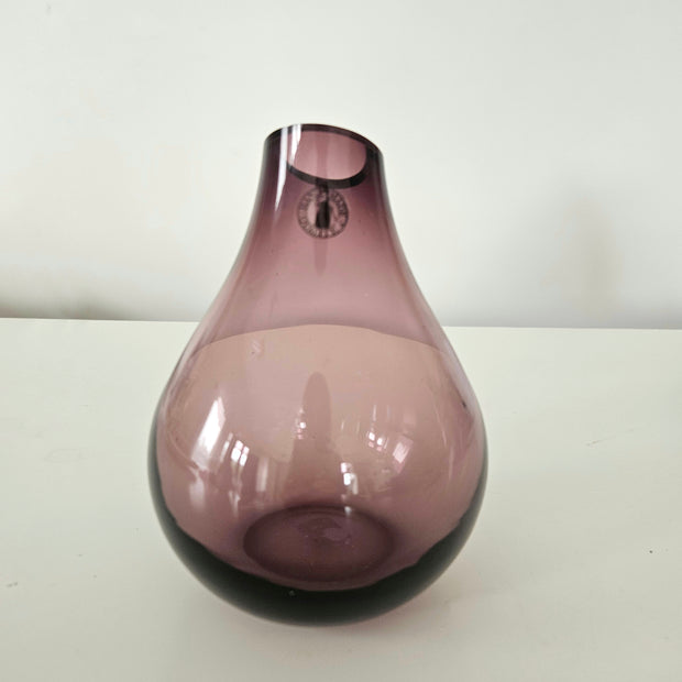 Purple bulb glass vase arrangement