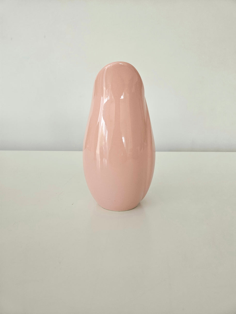 Pink ceramic vase on a white background