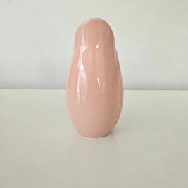Pink ceramic vase on a white background