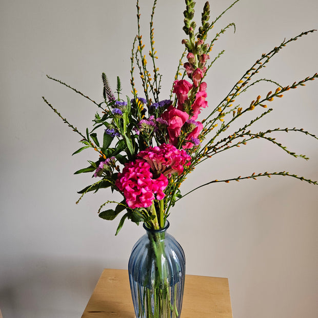 Tall blue edged glass vase