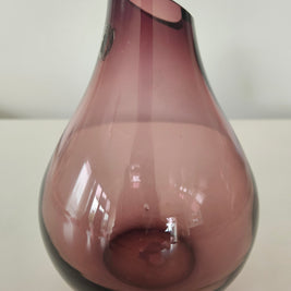 Purple bulb glass vase arrangement