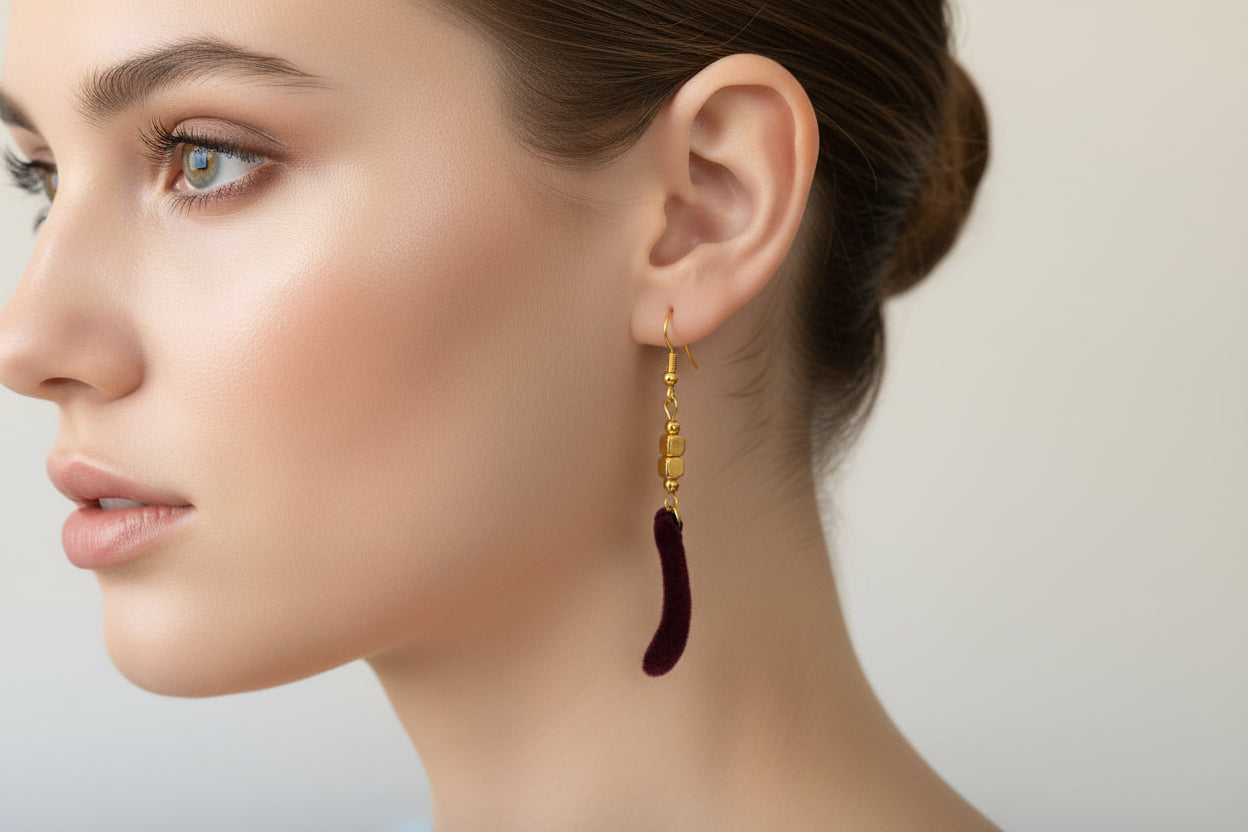 gold earrings with kangaroo paw