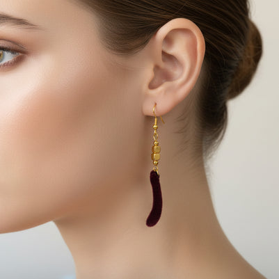 gold earrings with kangaroo paw